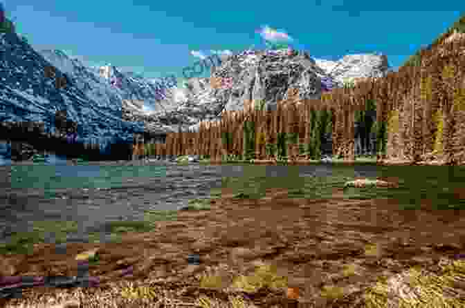 Panoramic View Of Rocky Mountain National Park With Snow Capped Peaks, Emerald Lakes, And Lush Forests. Best Of Rocky Mountain National Park